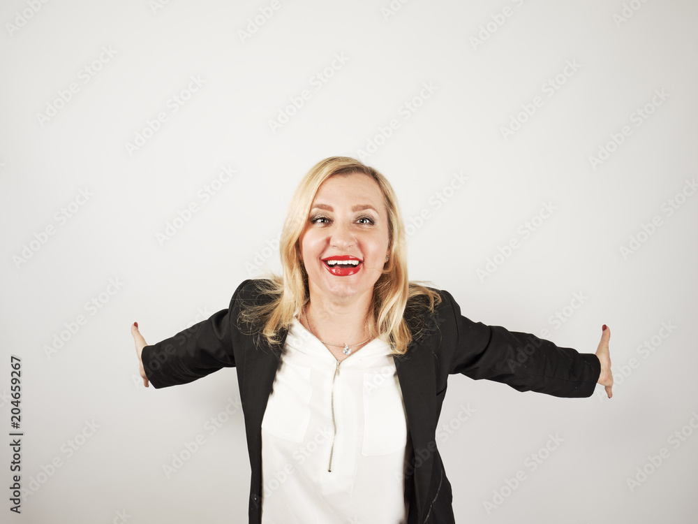 Attractive mature woman relax and dance on copy space. Portrait of happy girl imitating a flight forward with the help of her arms thrown back. Constant self-improvement concept Attractive mature woman relax and dance on copy space. Portrait of happy girl imitating a flight forward with the help of her arms thrown back. Constant self-improvement concept