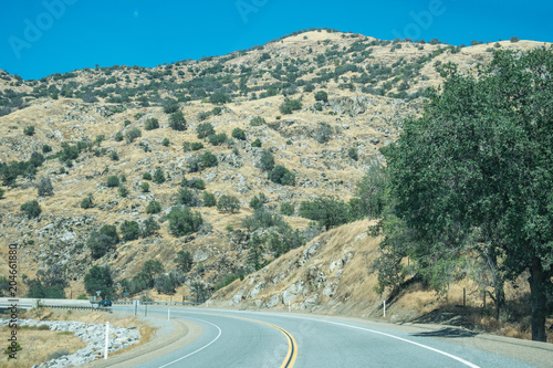 Picturesque road in the arid mountains of Sierra Nevada, California