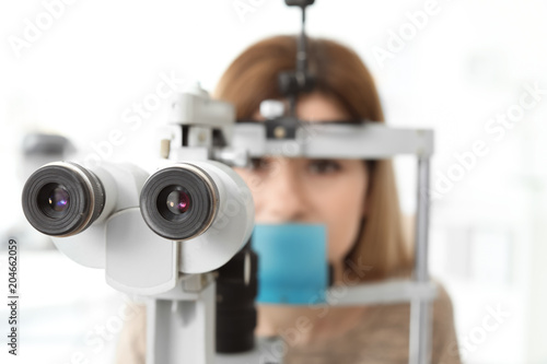 Woman visiting ophthalmologist in clinic