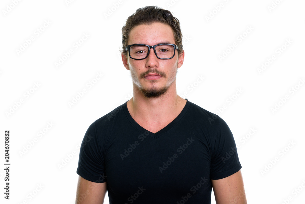 Studio shot of young handsome man with eyeglasses isolated again Studio shot of young handsome man with eyeglasses isolated again