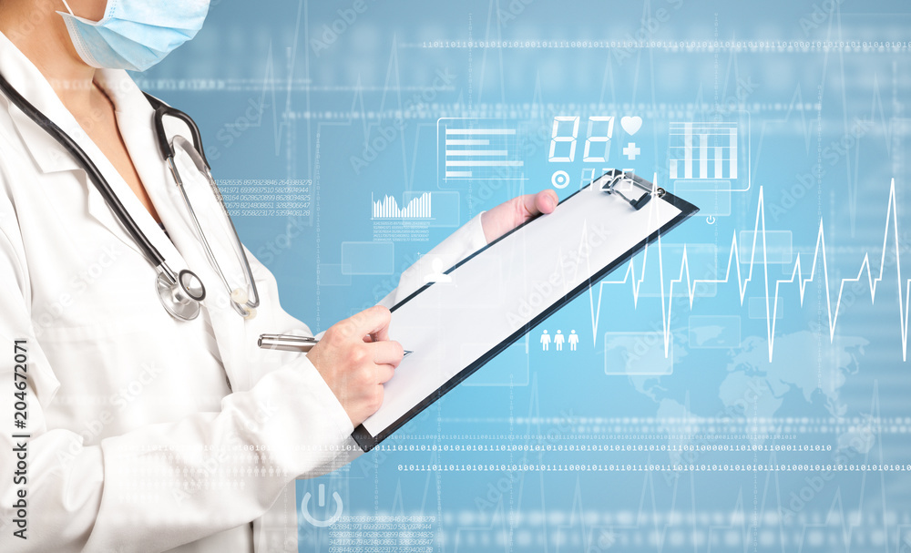 Female doctor holding notepad with blue background and heart related charts Female doctor holding notepad with blue background and heart related charts
