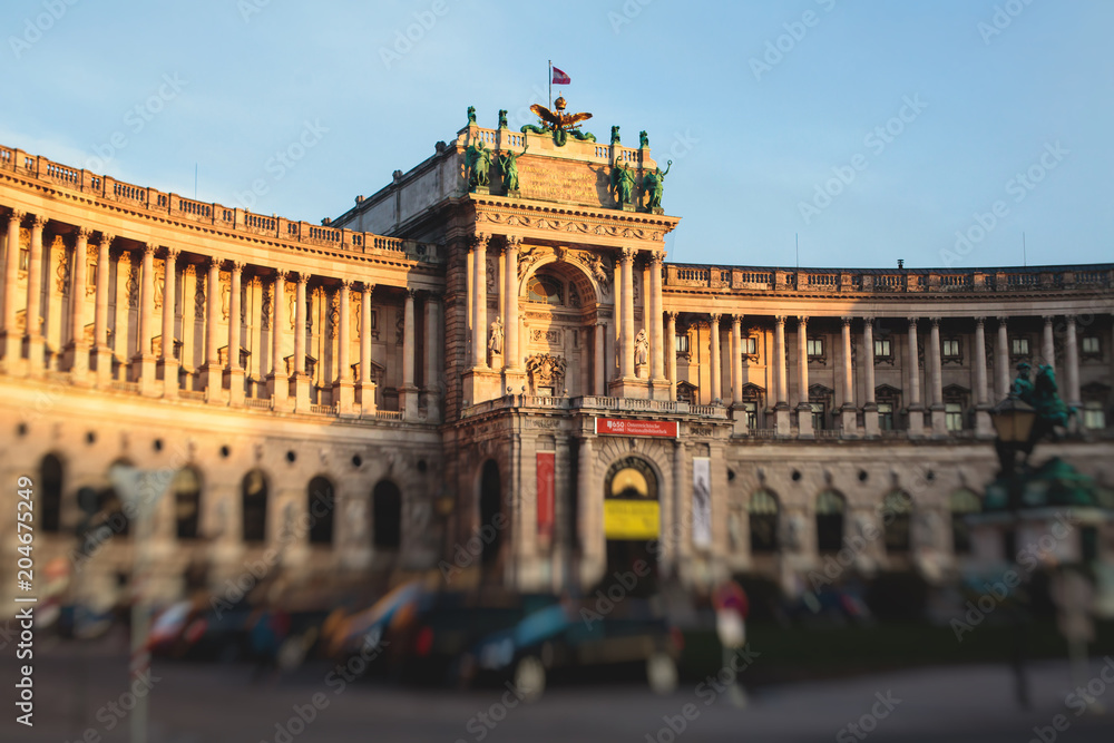  Library building facade exterior, established in 18th century, Hofburg Palace, Vienna, Austria, summer sunny day
