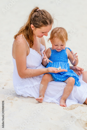 Young family at beach © BlueOrange Studio