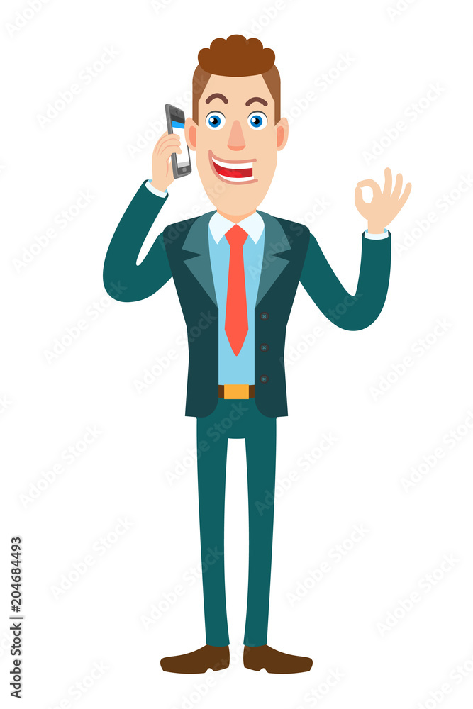 Businessman talking on mobile phone and showing a okay hand sign Businessman talking on mobile phone and showing a okay hand sign