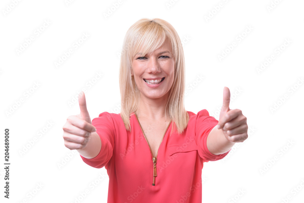 Enthusiastic motivated woman giving a thumbs up Enthusiastic motivated woman giving a thumbs up