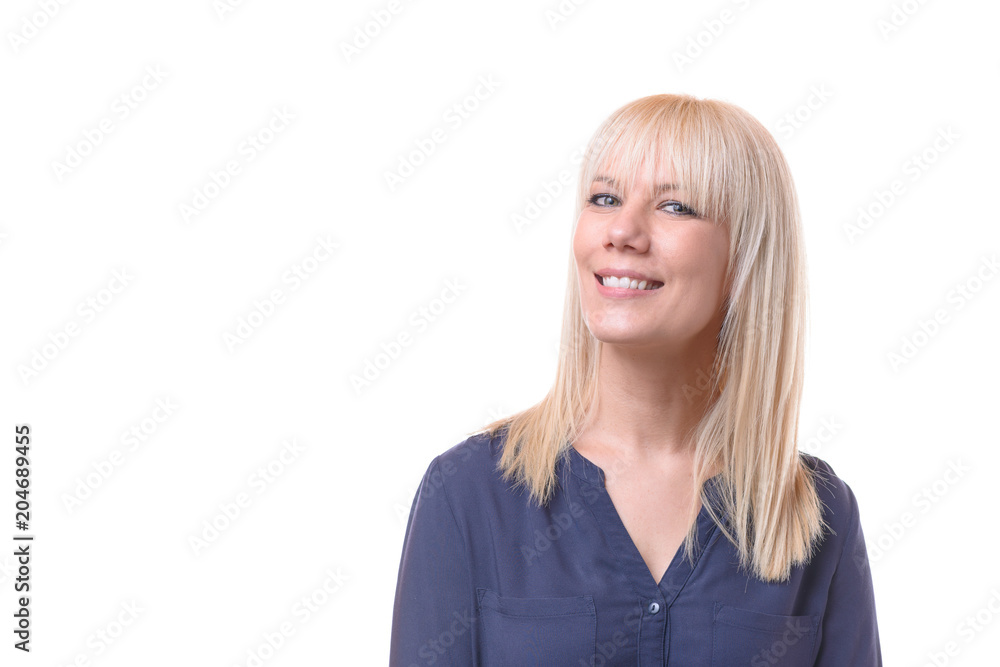 Smiling blond woman with her head turned away Smiling blond woman with her head turned away