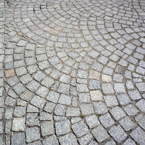 the Fragment of paving stone on the pavement in Poznan Poland
