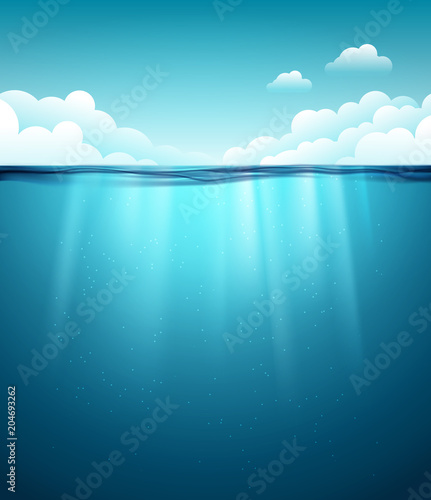 Underwater ocean surface. Blue water background. Clean nature sea underwater backdrop with sky © kolonko
