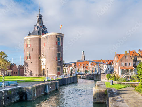 Drommedaris defence tower and bridge in old harbour of Enkhuizen, Netherlands photo