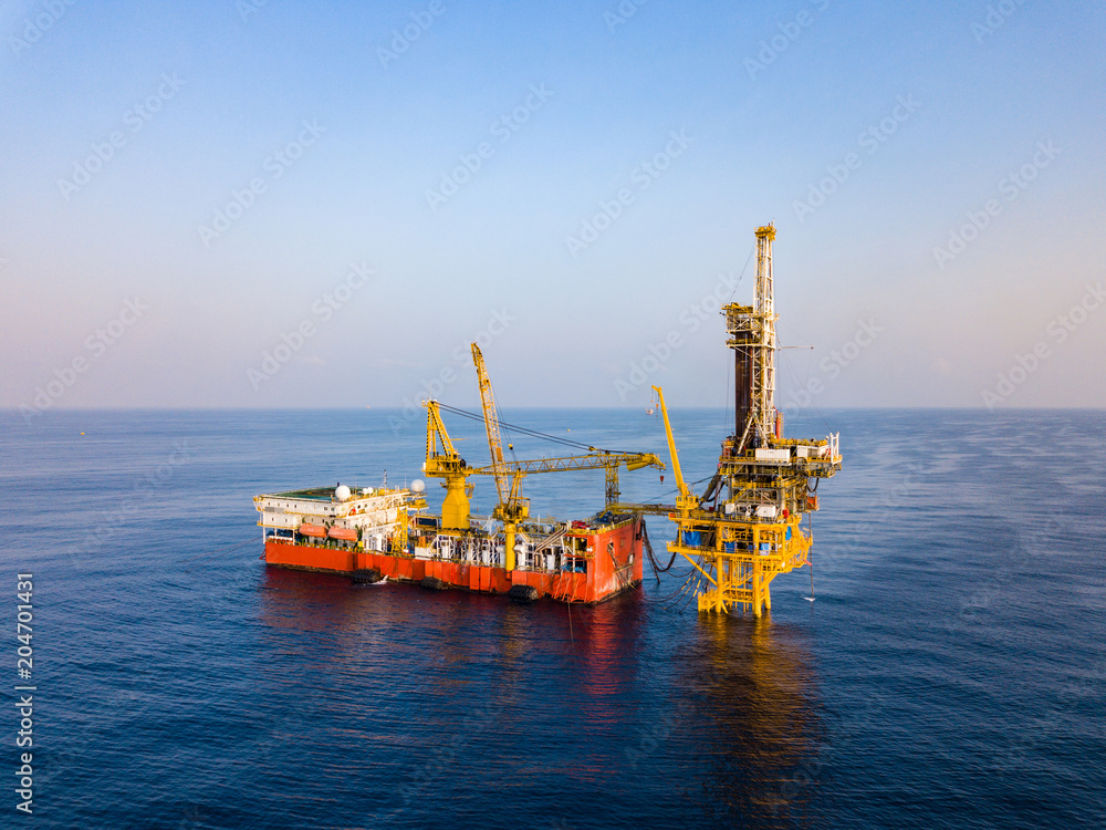Aerial View of Tender Drilling Oil Rig (Barge Oil Rig) in The Middle of ...