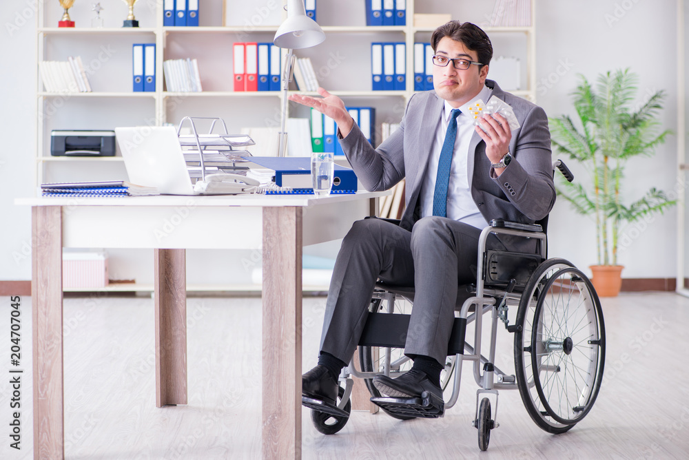 Fototapeta premium Disabled businessman working in the office