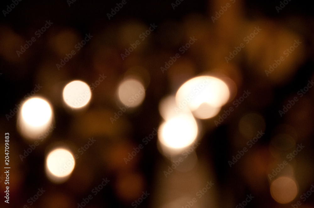 Defocused light yellow bokeh festive background Defocused light yellow bokeh festive background