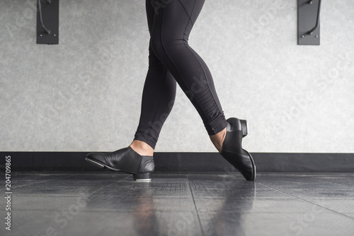 Toe Heel stand in tap shoes during dance class