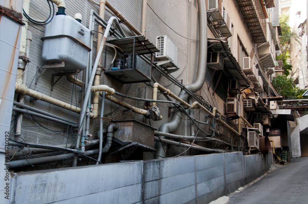 Air conditionings congested on building wall Air conditionings congested on building wall