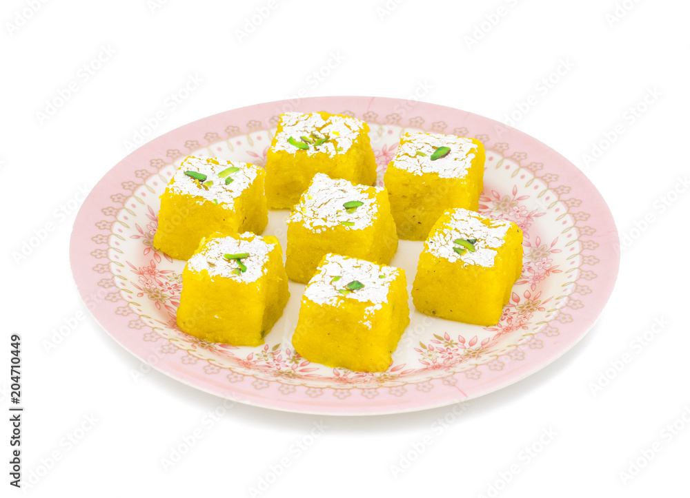 Indian Sweet Kopra pak Also Know as Barfi is a Gujarati style of making coconut burfi. This sweet or mithai is made from freshly grated coconut, sugar, milk and mawa. Indian Sweet Kopra pak Also Know as Barfi is a Gujarati style of making coconut burfi. This sweet or mithai is made from freshly grated coconut, sugar, milk and mawa.