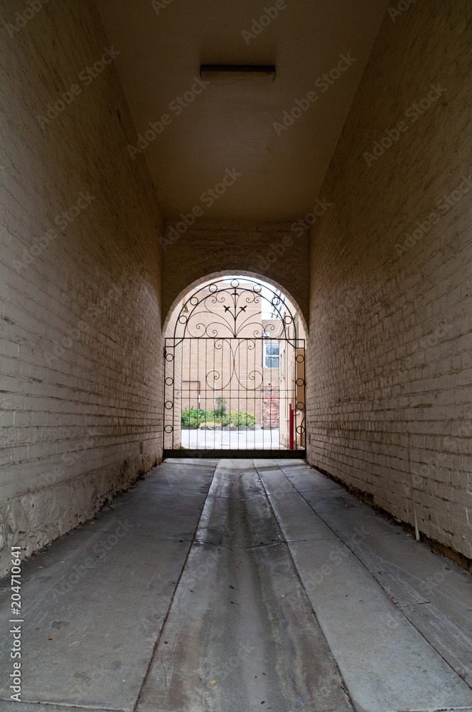 Obraz premium European long white brick tunnel