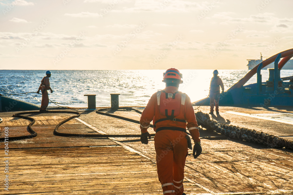 Anchorhandling Tug Supply AHTS vessel crew preparing vessel for static
