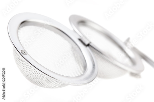 Tea strainer on a chain isolated for white background.