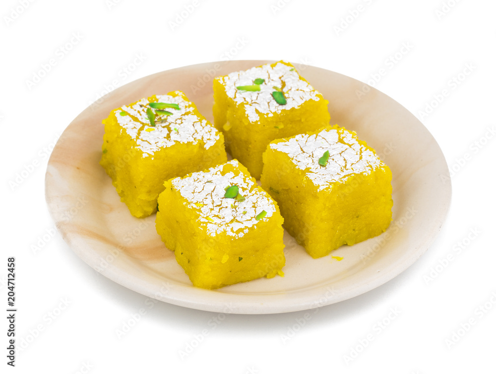 Indian Sweet Kopra pak Also Know as Barfi is a Gujarati style of making coconut burfi. This sweet or mithai is made from freshly grated coconut, sugar, milk and mawa. Indian Sweet Kopra pak Also Know as Barfi is a Gujarati style of making coconut burfi. This sweet or mithai is made from freshly grated coconut, sugar, milk and mawa.