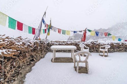 Snow covered dhankar village - spiti valley, himachal pradesh / india photo