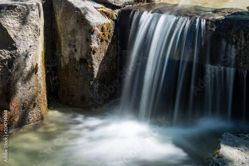 long exposure of small waterfall in the park