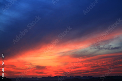 abstract blue and red sky sunlight is beautiful nature sky and cloud background © Tanewpix4289