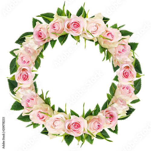Beautiful white rose flowers and leaves in a round frame