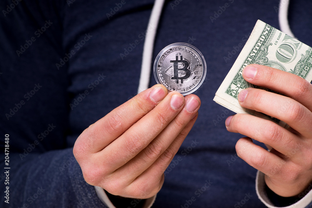 Young man in bitcoin mining concept Young man in bitcoin mining concept