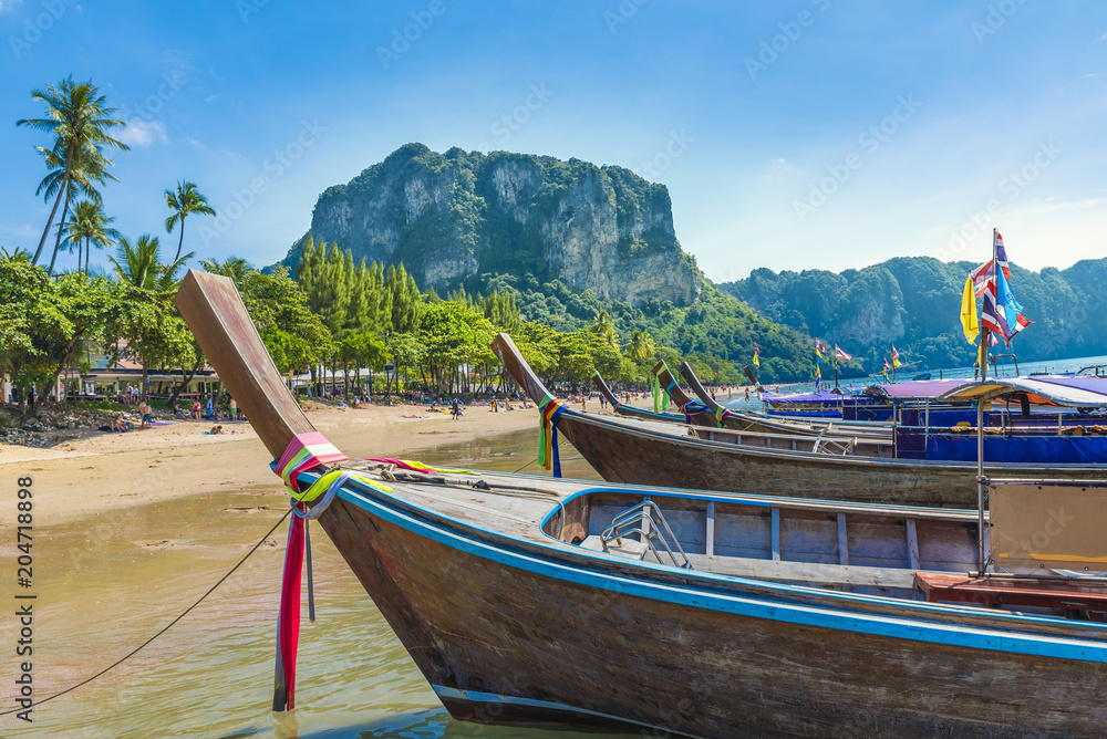 Long tail boats of Ao Nang beach in Krabi region, Thailand Long tail boats of Ao Nang beach in Krabi region, Thailand