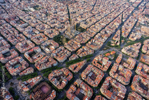 Barcelona aerial view, Eixample residencial district with typical urban grid, Spain. Late afternoon light