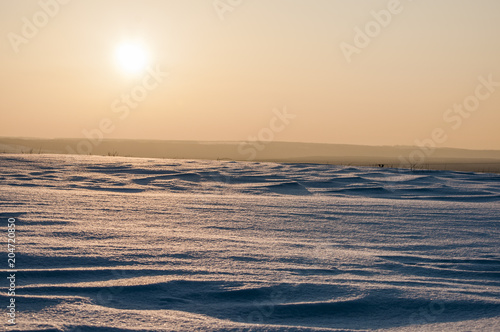 sunset against the snow  winter landscape