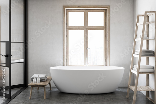 White bathtub in a luxury bathroom