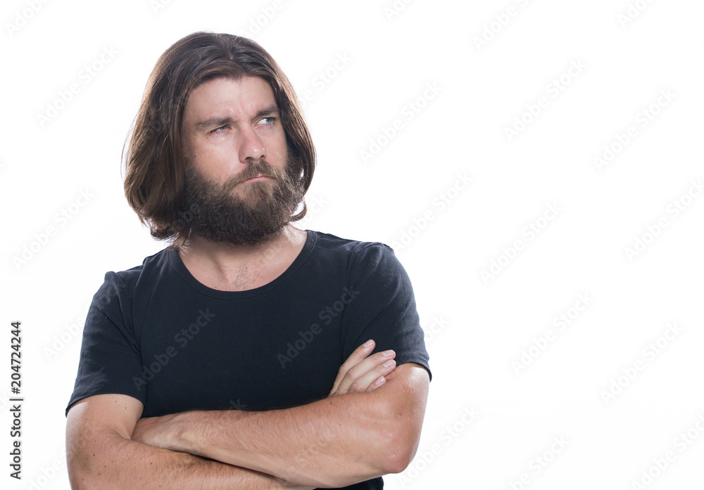 Fototapeta premium Portrait of handsome confident man with beard in standing with crossed arms isolated on white