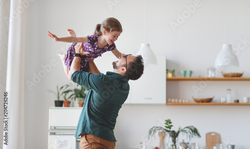Konstfotografi Father's day. Happy family daughter hugs his dad