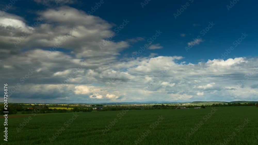 Time lapse - Moving clouds over a wheat field, Wetterau, Germany Time lapse - Moving clouds over a wheat field, Wetterau, Germany