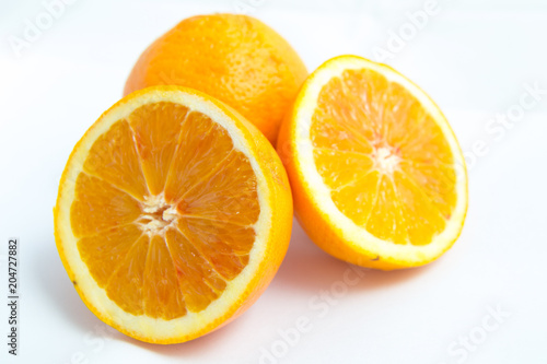 yellow oranges on white background