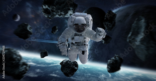 Фотография Astronaut floating in space 3D rendering elements of this image furnished by NAS