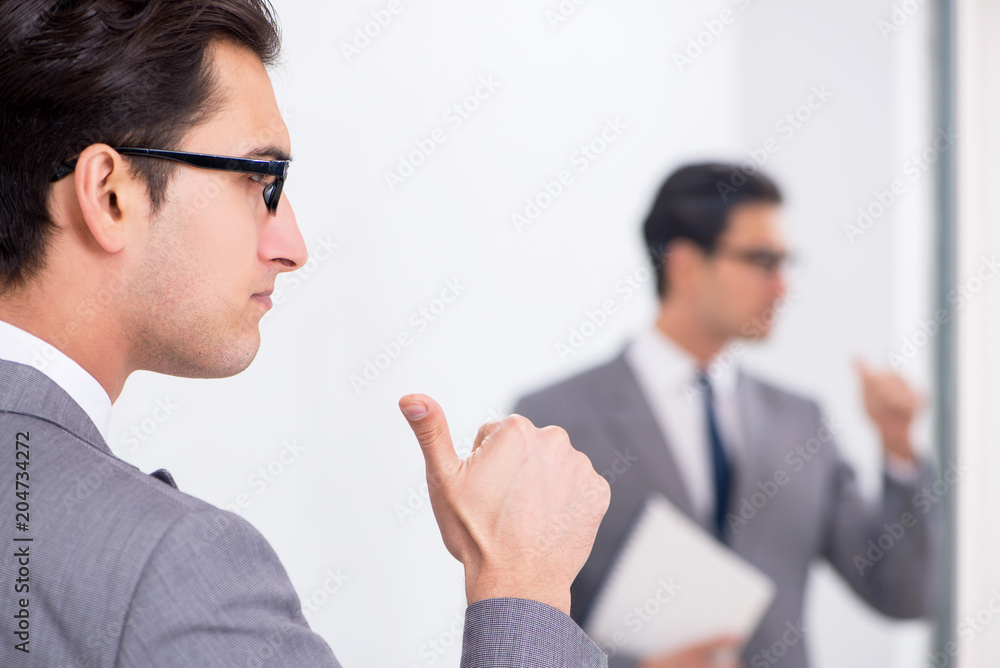 Politician planning speach in front of mirror Politician planning speach in front of mirror