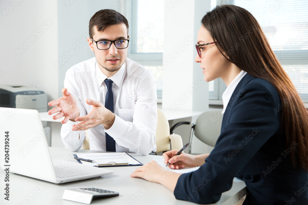 Business people working together in the office Business people working together in the office