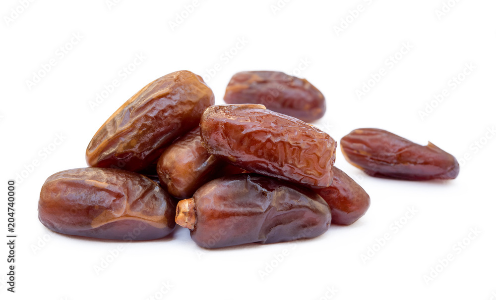 Dried sweet dates isolated on a white background Dried sweet dates isolated on a white background