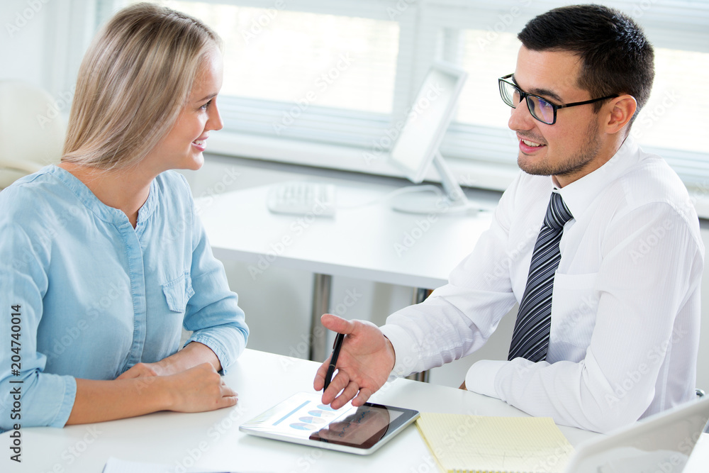 Business people working in an office Business people working in an office