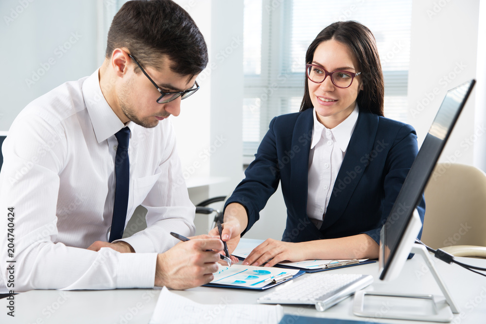 Business people working in an office Business people working in an office