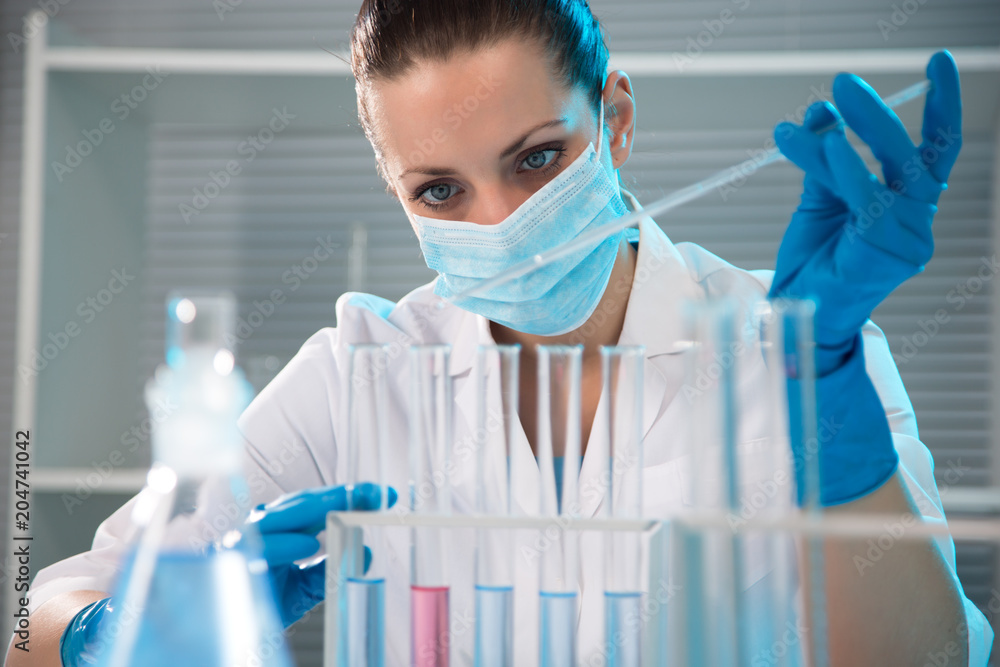 Female scientist working in laboratory Female scientist working in laboratory