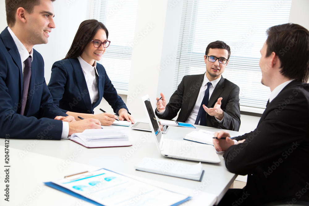 Business people working together in the office Business people working together in the office