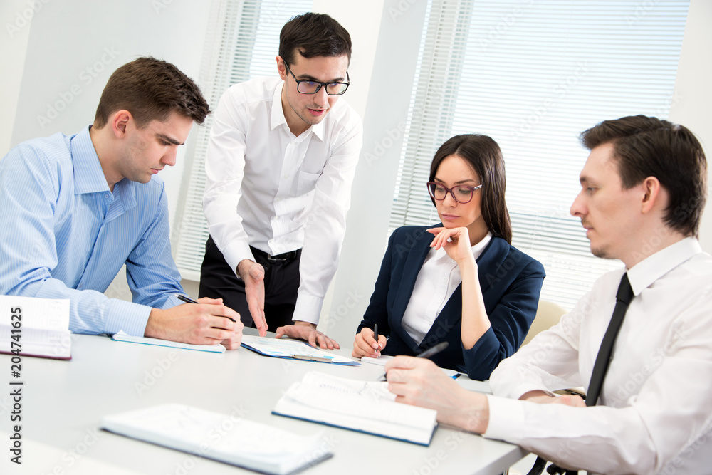 Businesspeople discuss a new project Businesspeople discuss a new project