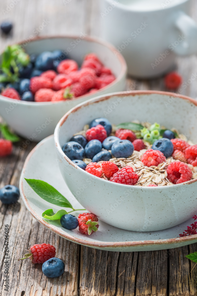 Oat flakes with fresh blueberries and raspberries Oat flakes with fresh blueberries and raspberries