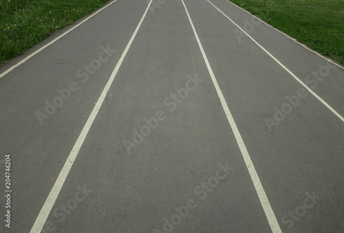 road in a sports stadium, vertical lines © Laura Сrazy