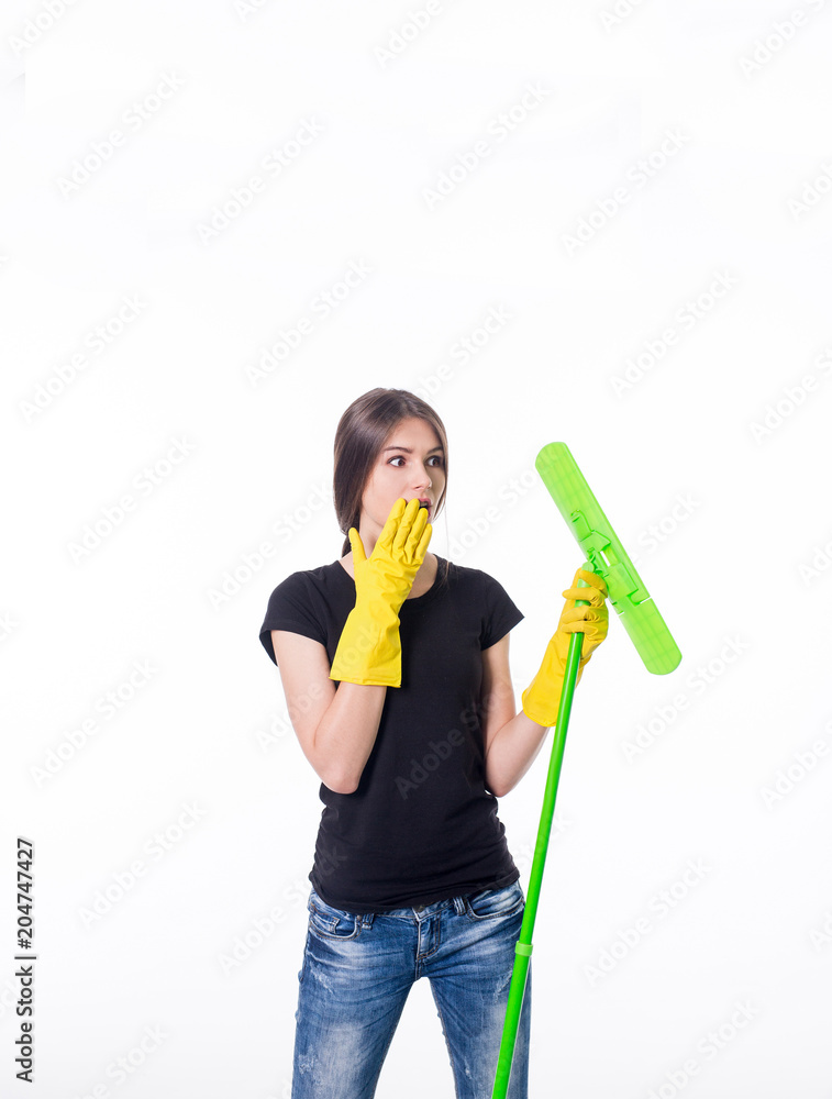 Cleaning girl happy excited during cleaning. Funny girl with cleaning mop isolated on white background Cleaning girl happy excited during cleaning. Funny girl with cleaning mop isolated on white background