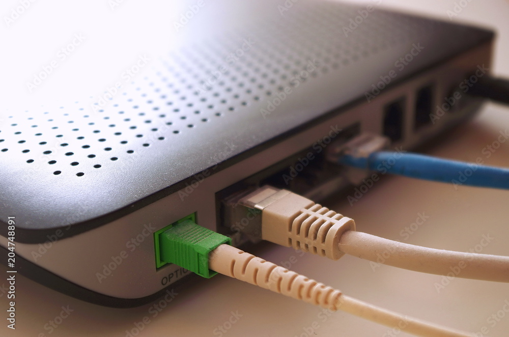 fiber optic Internet,network cable connected to a router, internet concept,  speed test Stock Photo | Adobe Stock