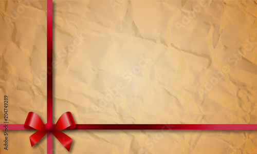 gift ribbon on crumpled wrapping paper
